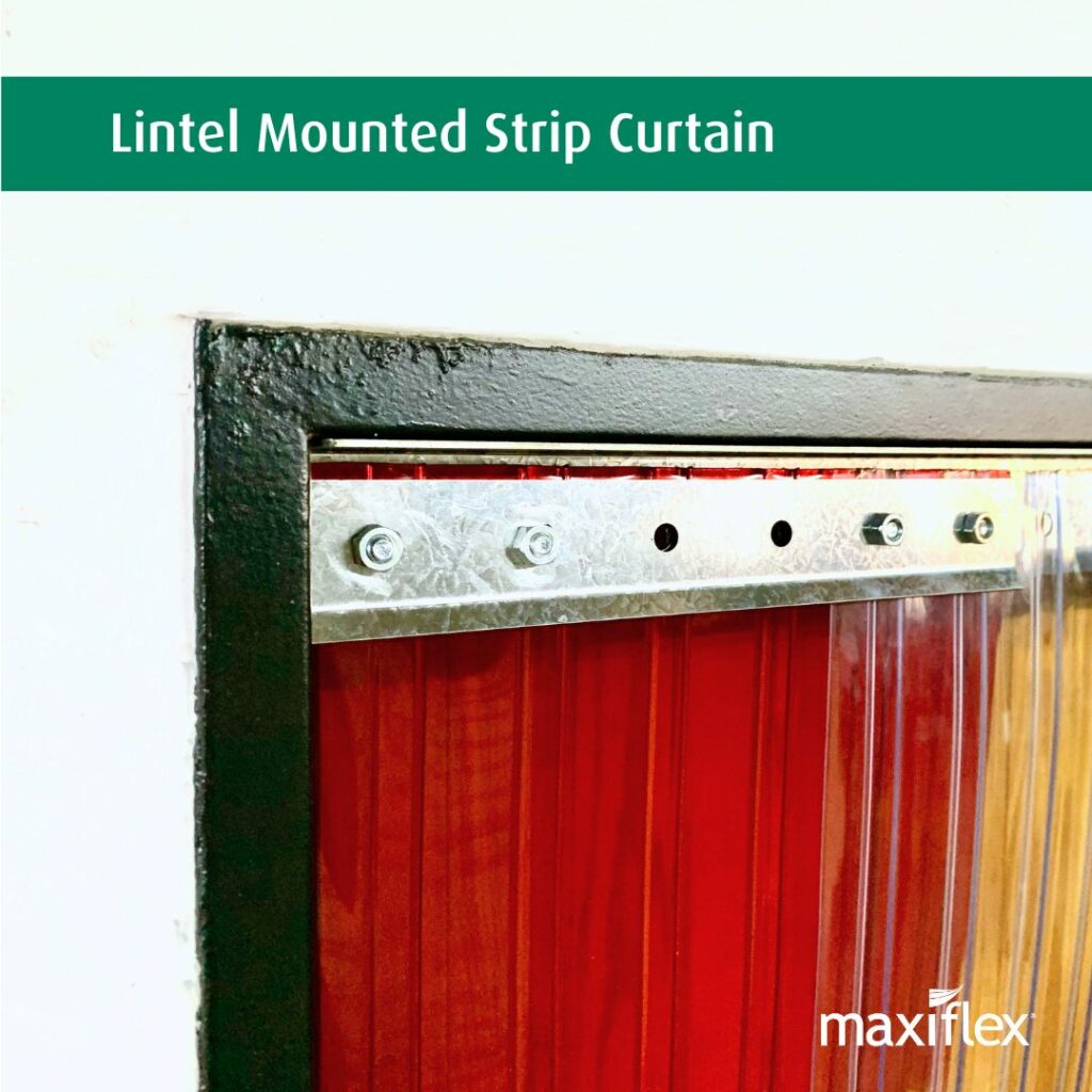 Red and clear strip curtain material lintel mounted on a fixed bracket